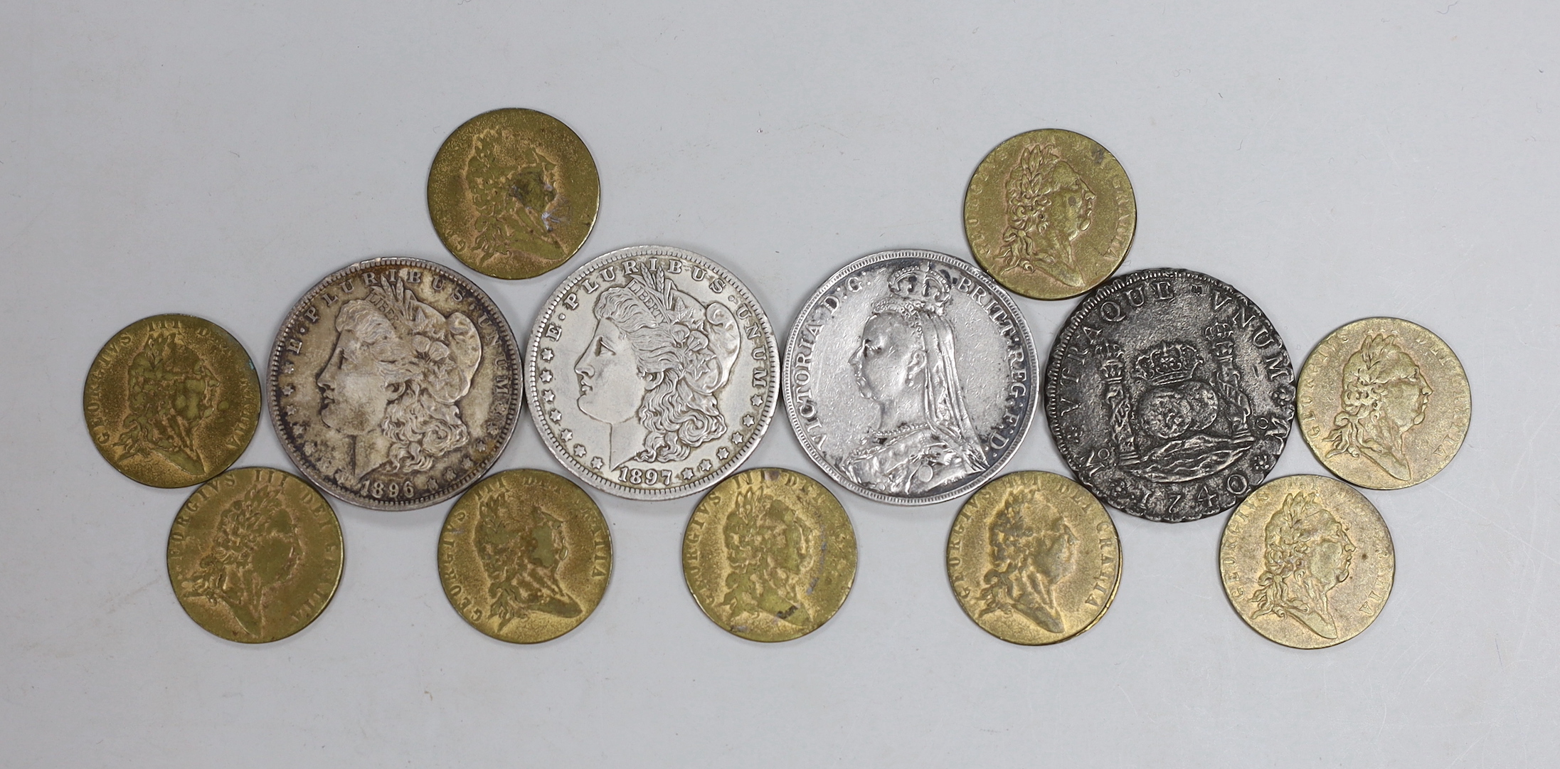 Coinage: a Victoria crown 1891 and two US Morgan dollars 1897 and 1896 dollar etc